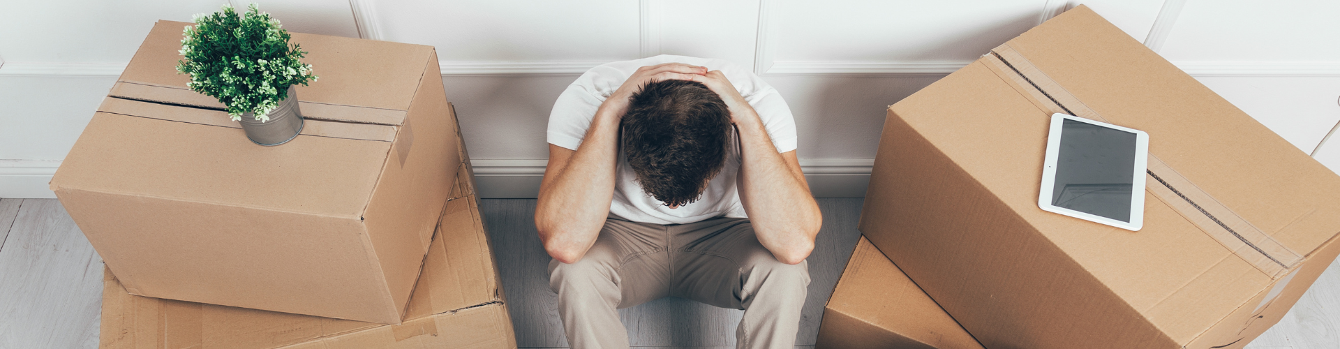 A man sitting in a box.