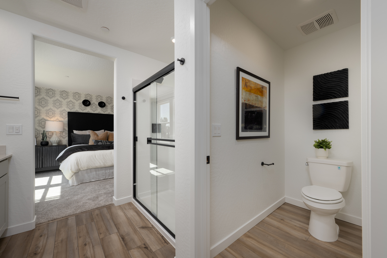 A bathroom with a glass shower.
