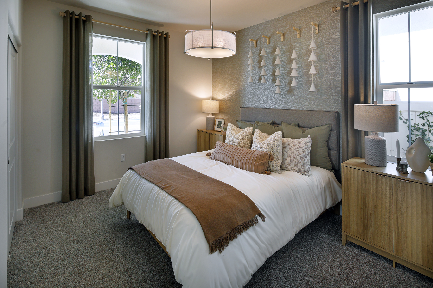 A bedroom with a large bed.