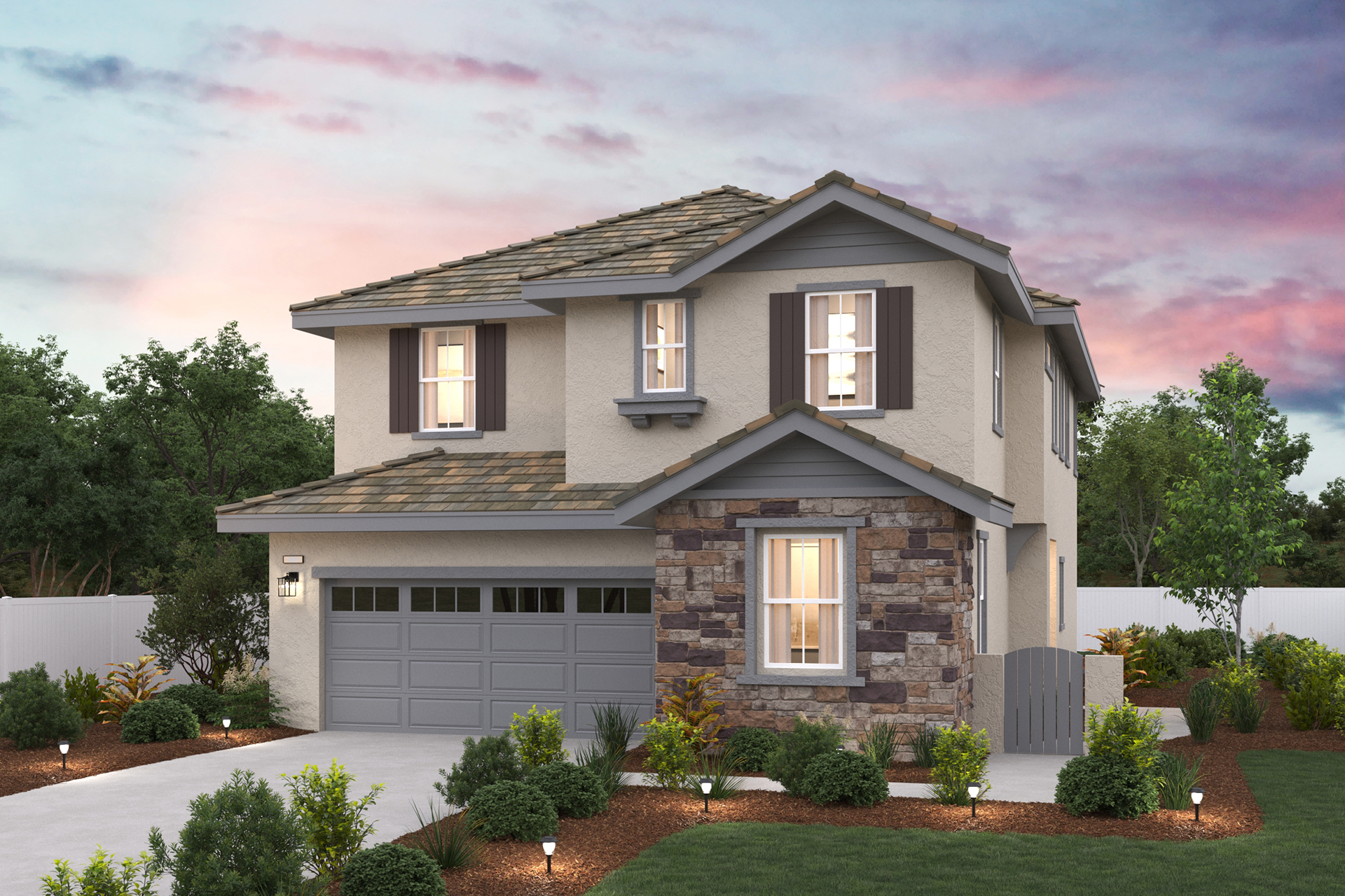 A house with a garage and trees.