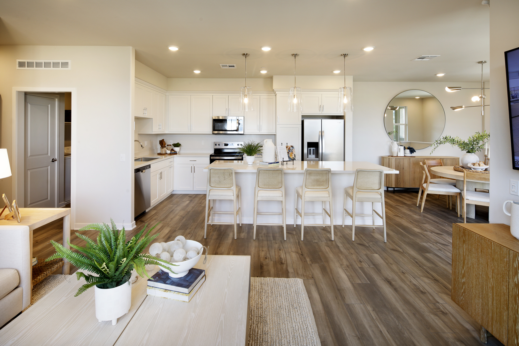 A large kitchen with white cabinets.