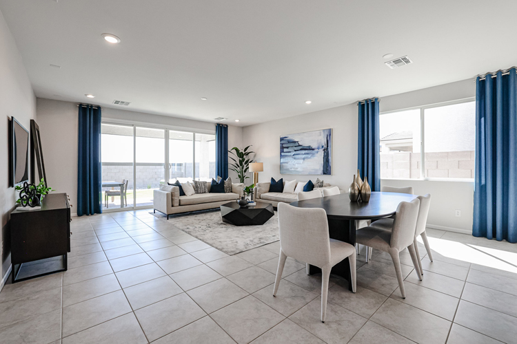 A large living room with a large window.