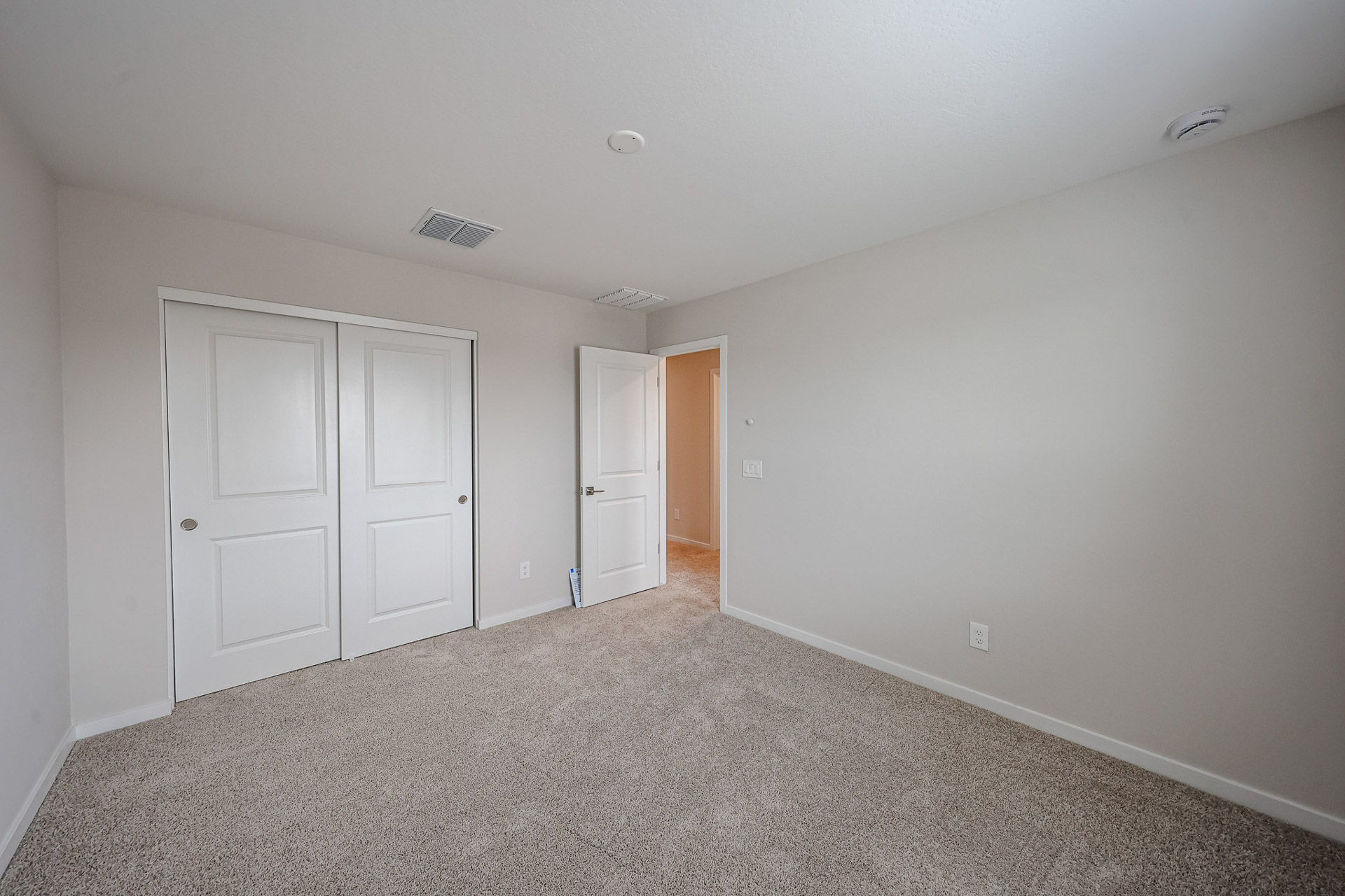 A room with white doors.
