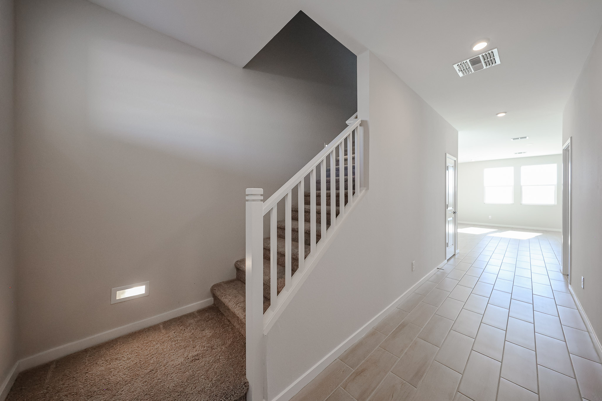 A white staircase in a house.