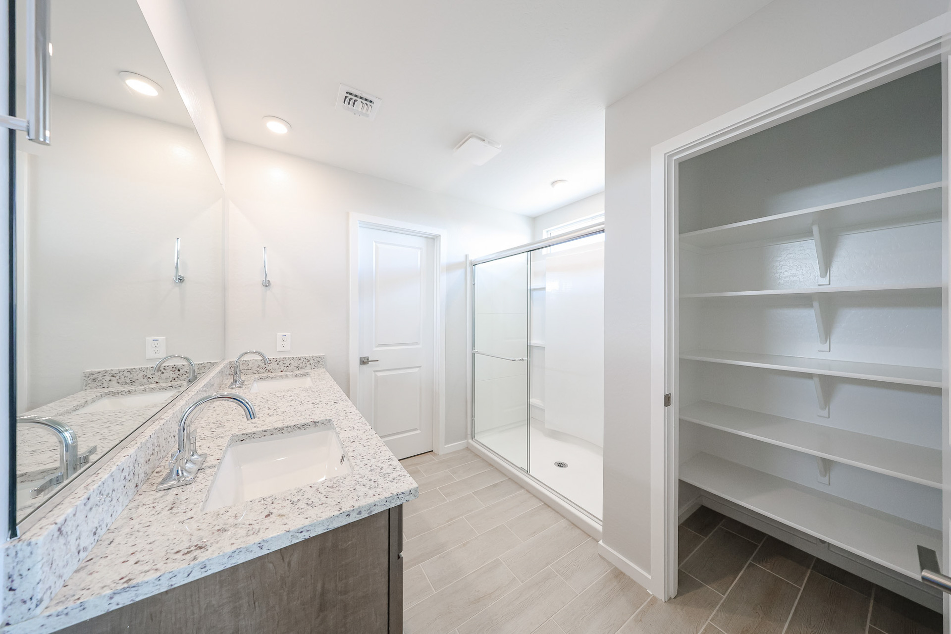 A bathroom with a glass shower.