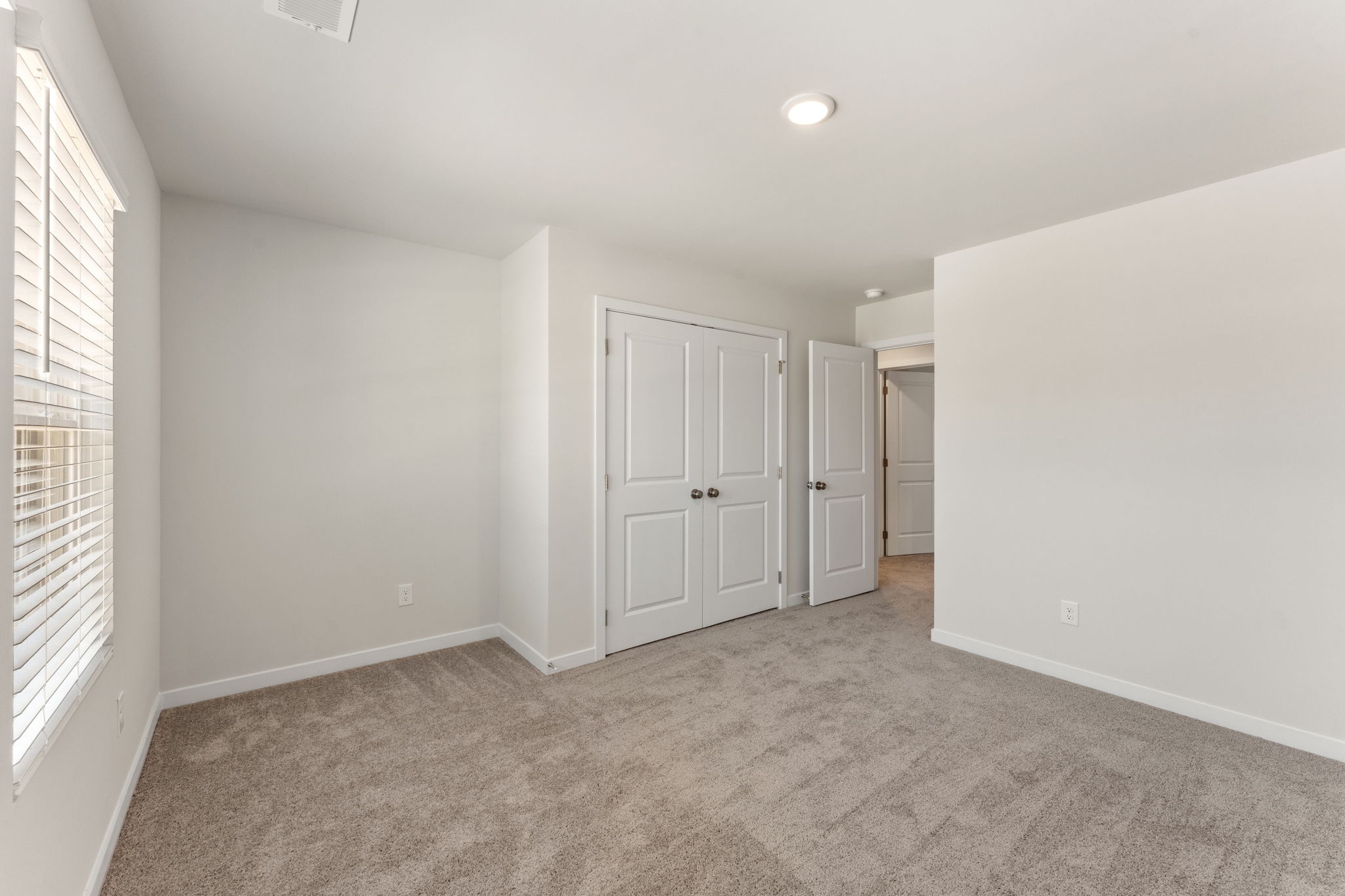 A room with white doors.