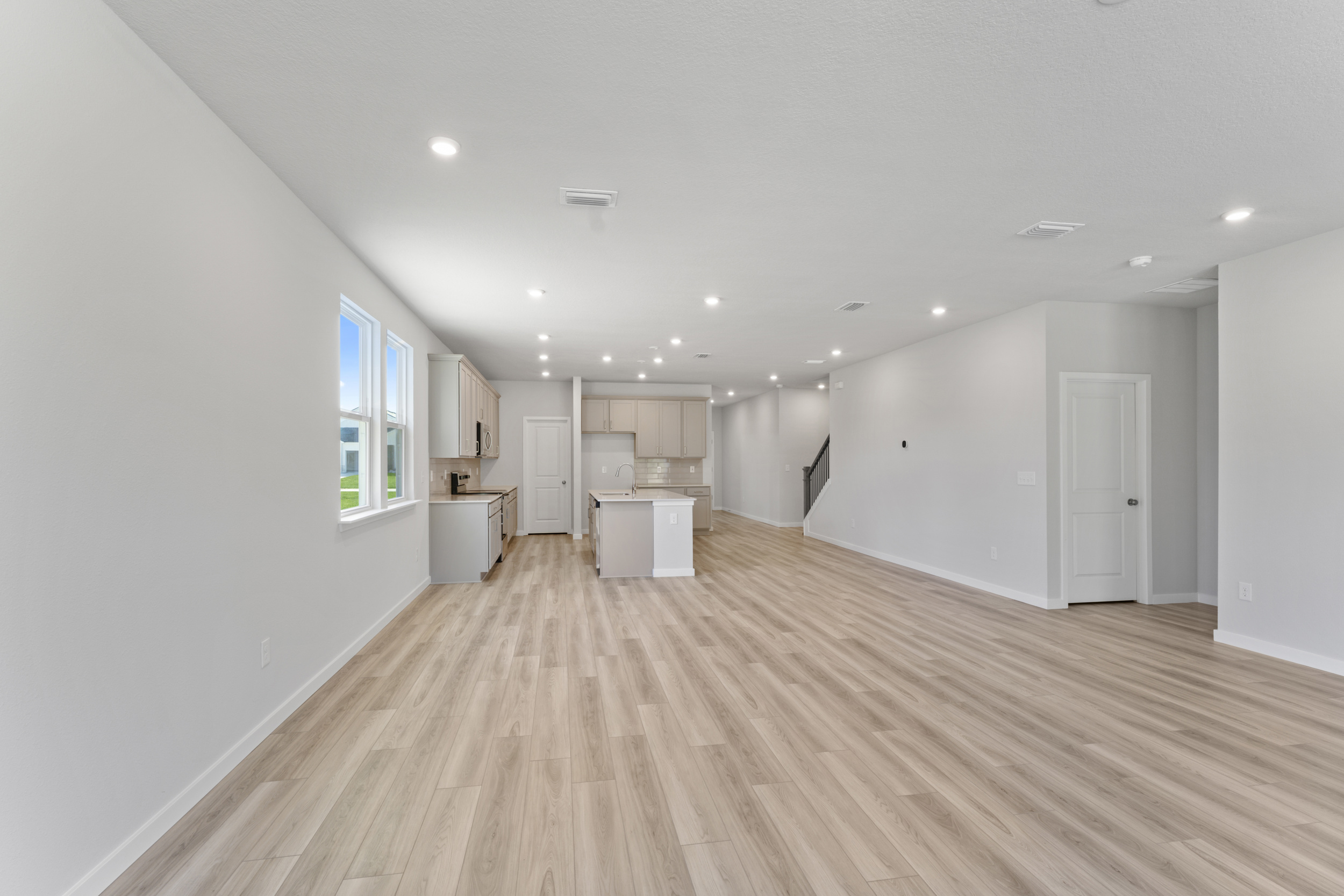 Lot 529 Chef's Kitchen with Gray Cabinets at NorthShore in Kingsland