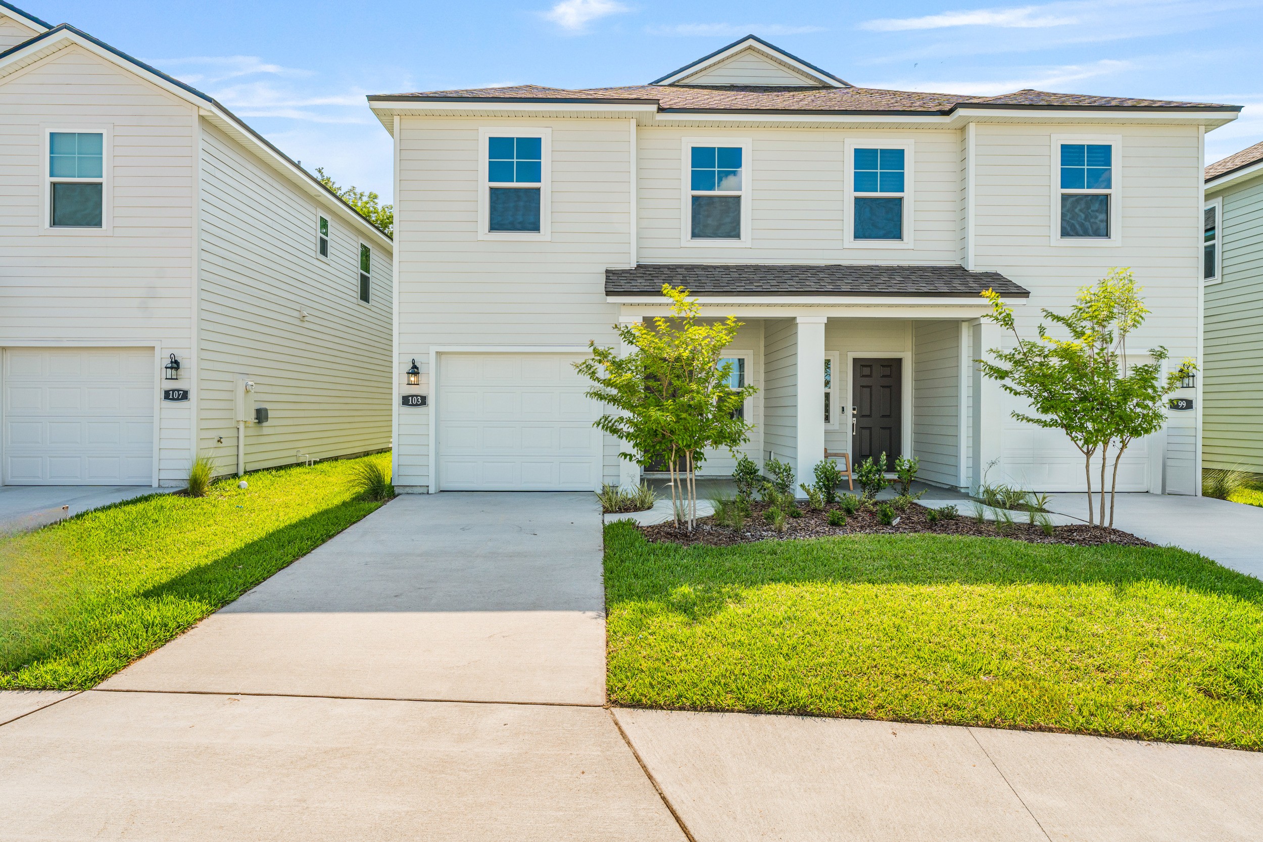 Davor Paired Home with Tan Exterior at The Landings at Pecan Park in Jacksonville