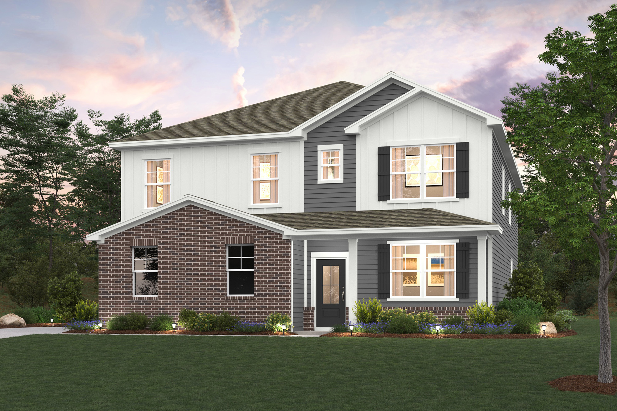 A house with a lawn in front of it.