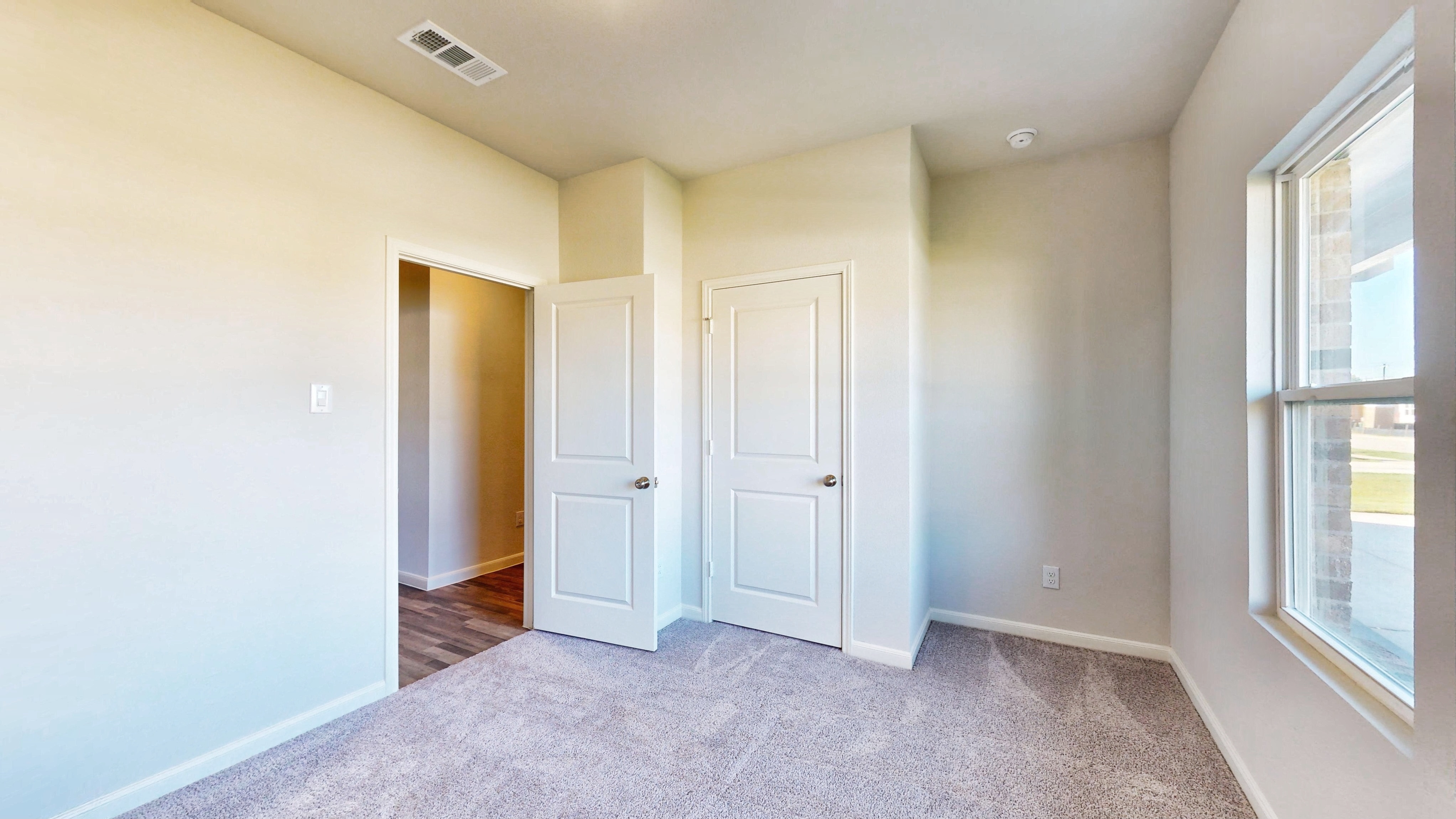A room with white doors.