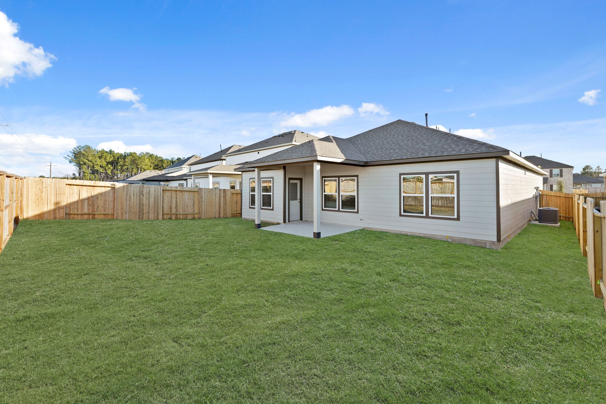 A house with a fence around it.