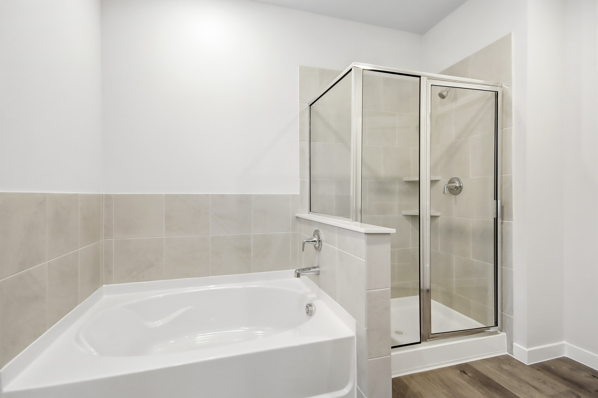 A bathroom with a glass shower.