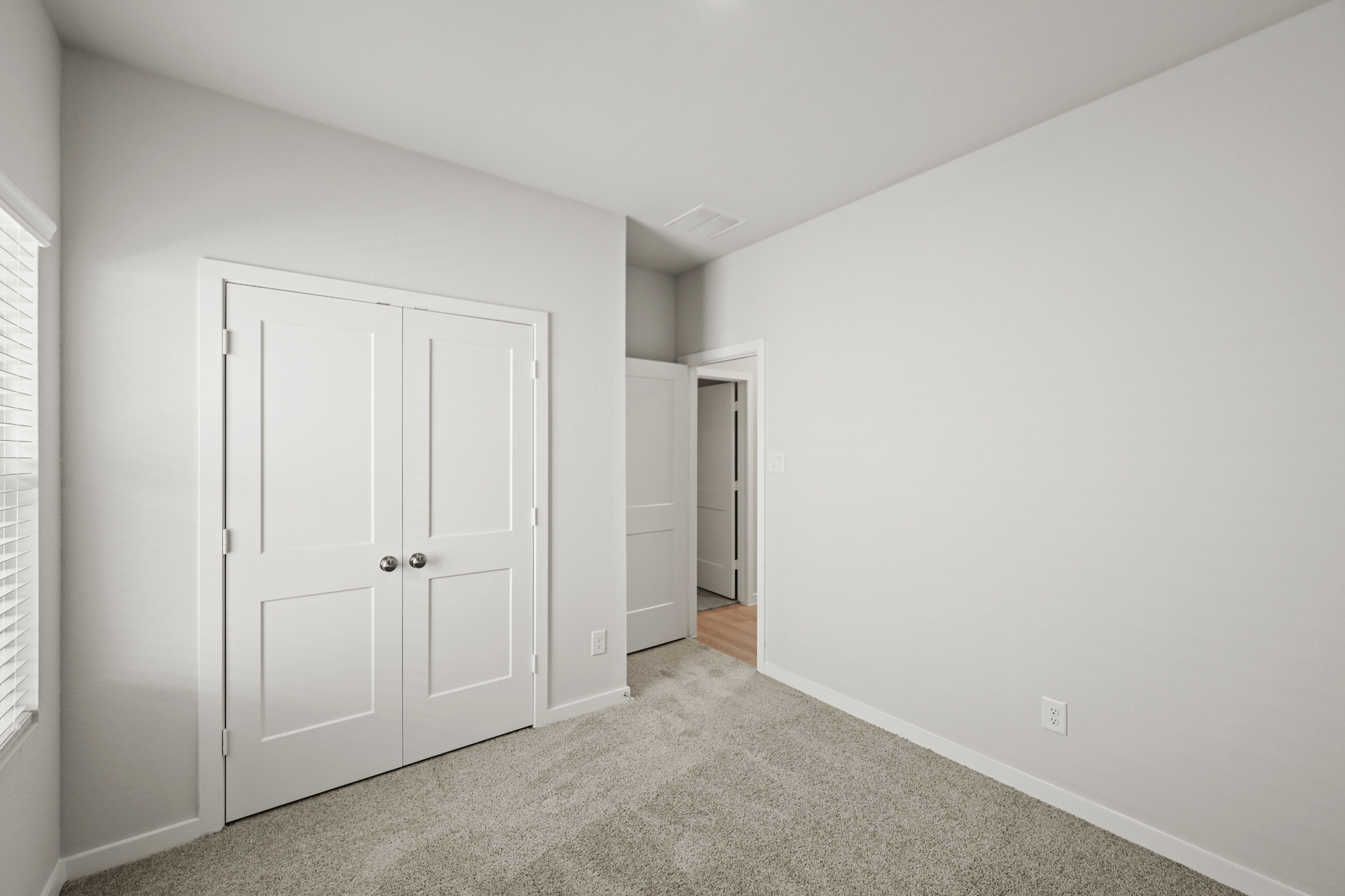 A room with white doors.