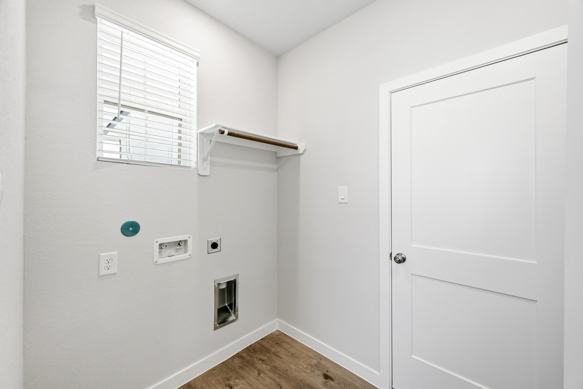 A white door with a window.