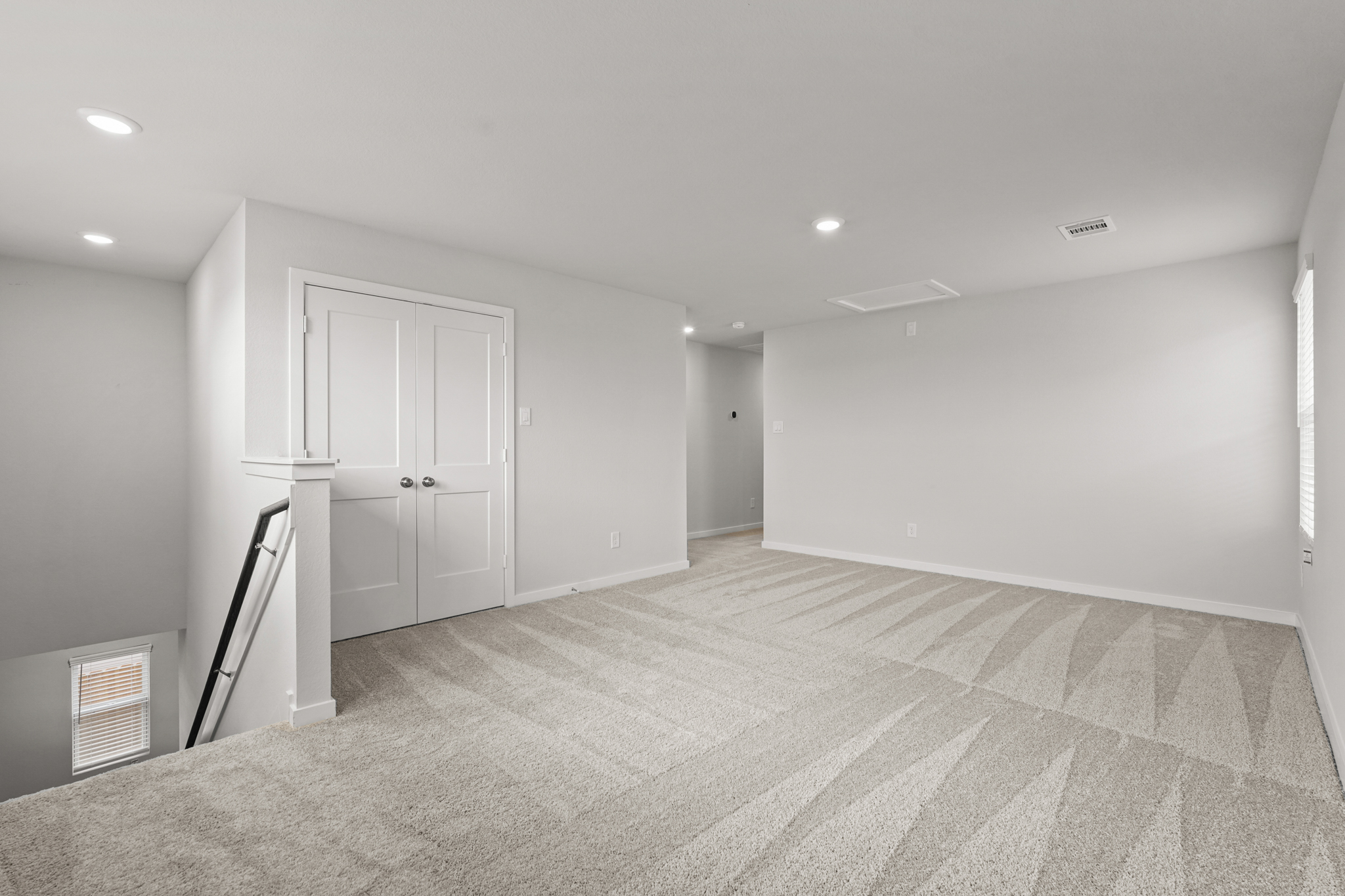 A room with white doors.