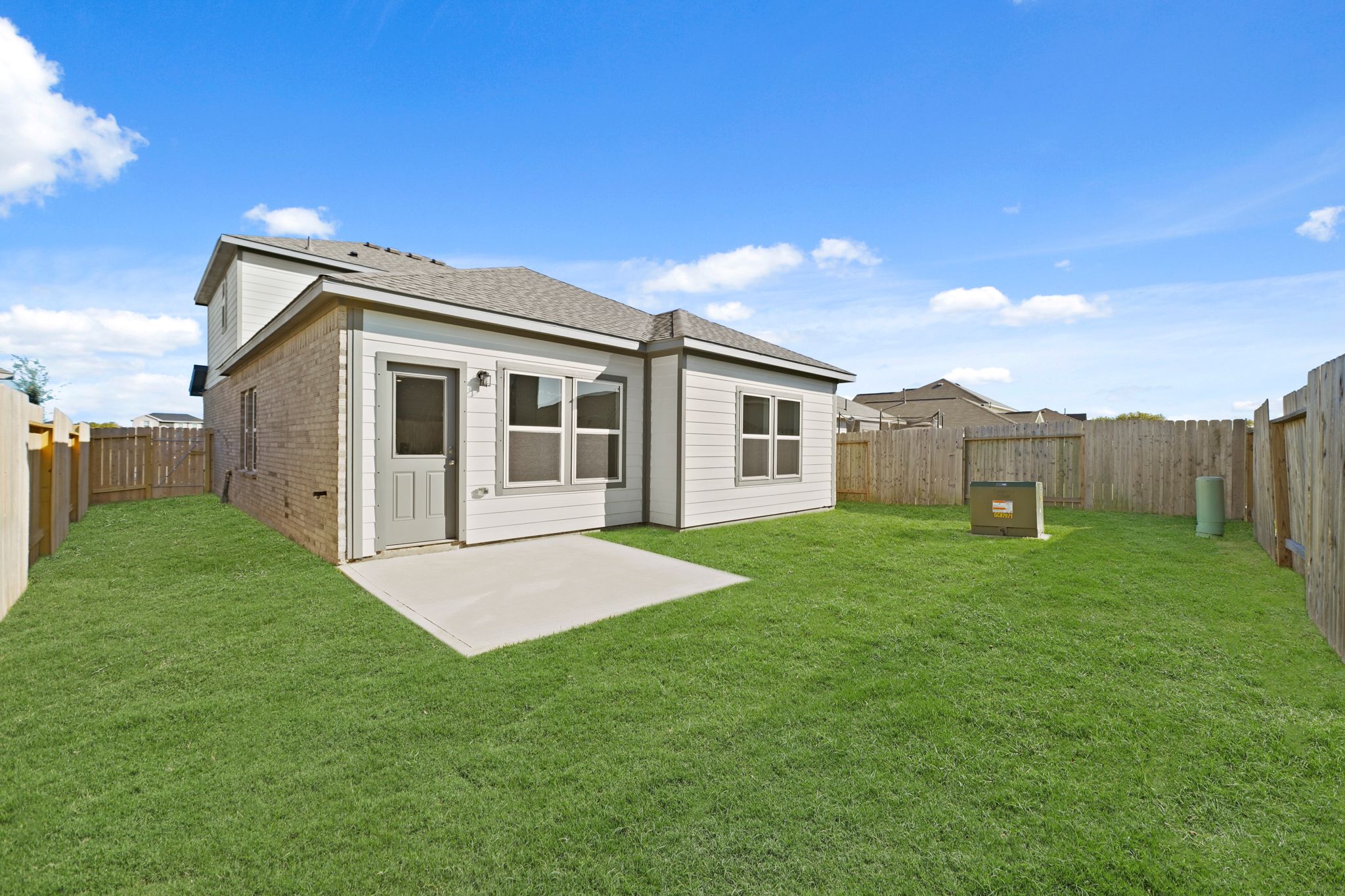 A house with a fence around it.