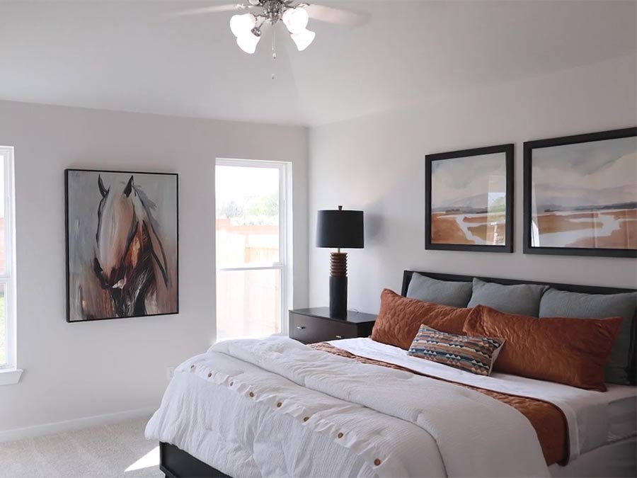 A bedroom with two beds.