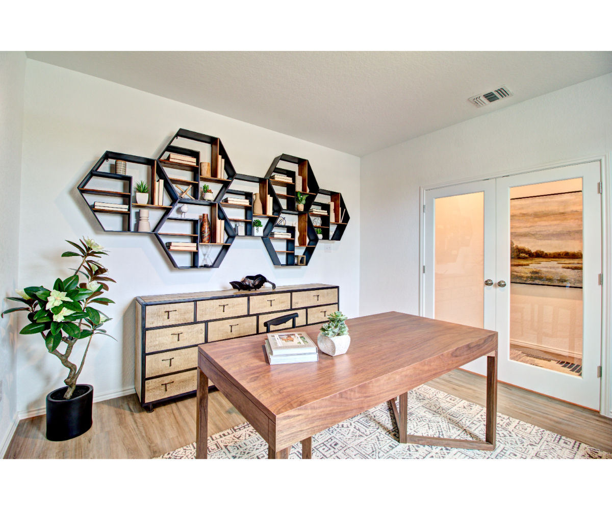 A table with a plant on it.