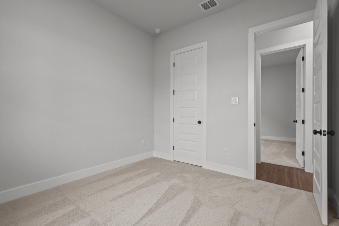 A room with white doors.