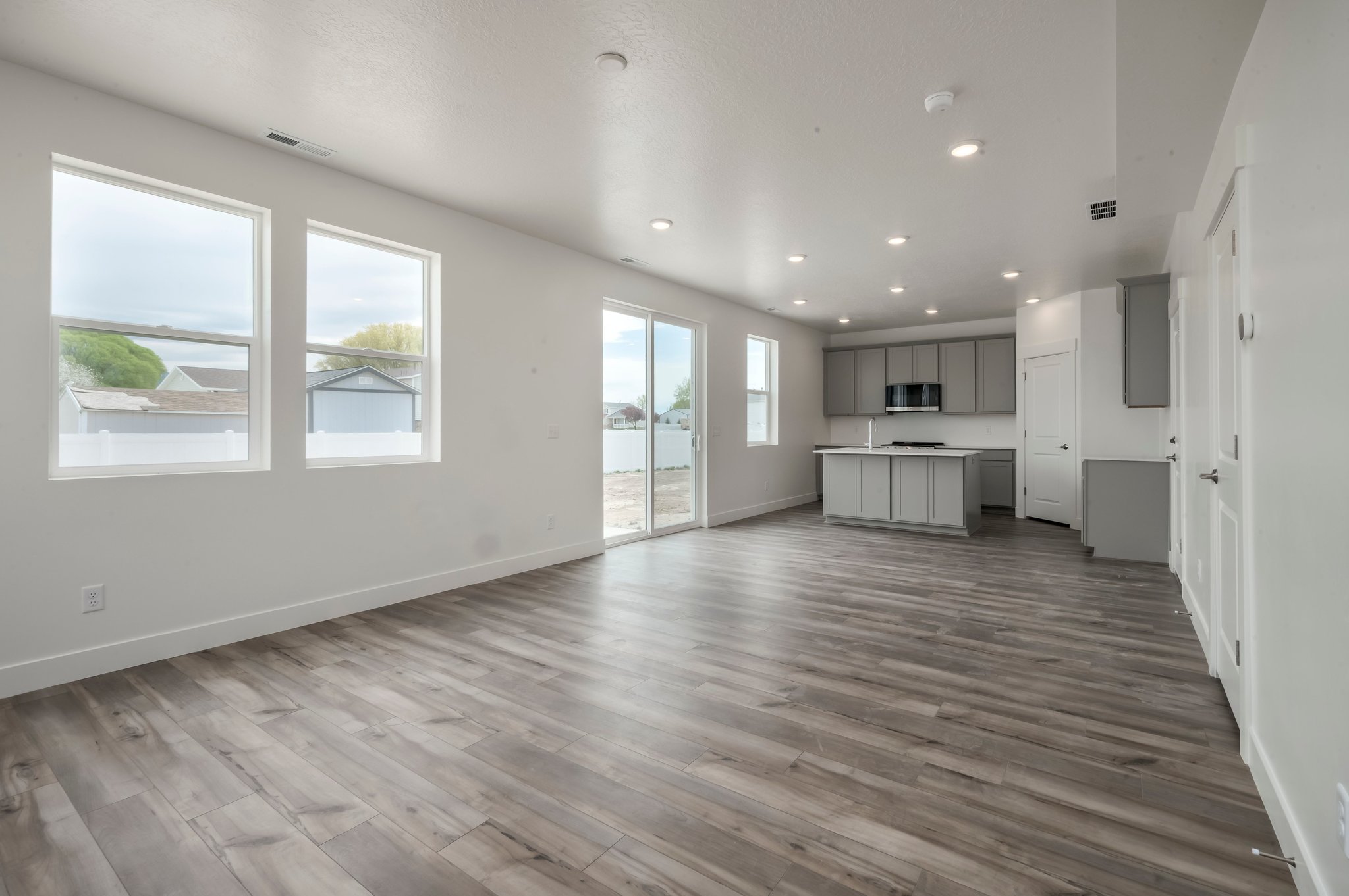 A large empty room with white walls.