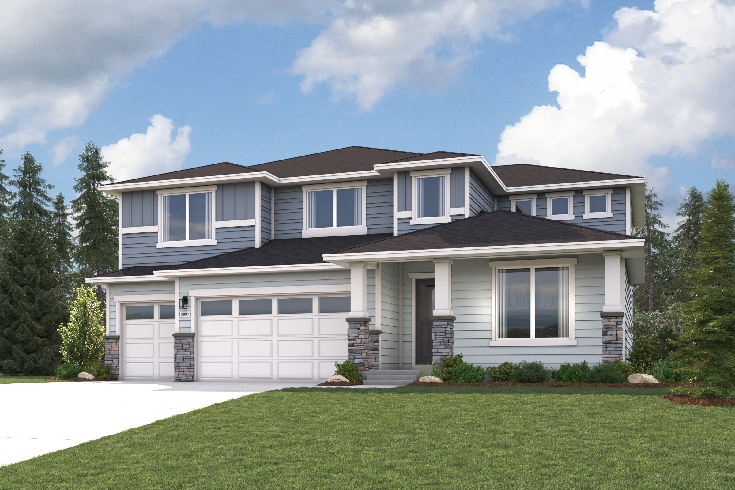 A house with a lawn in front of it.