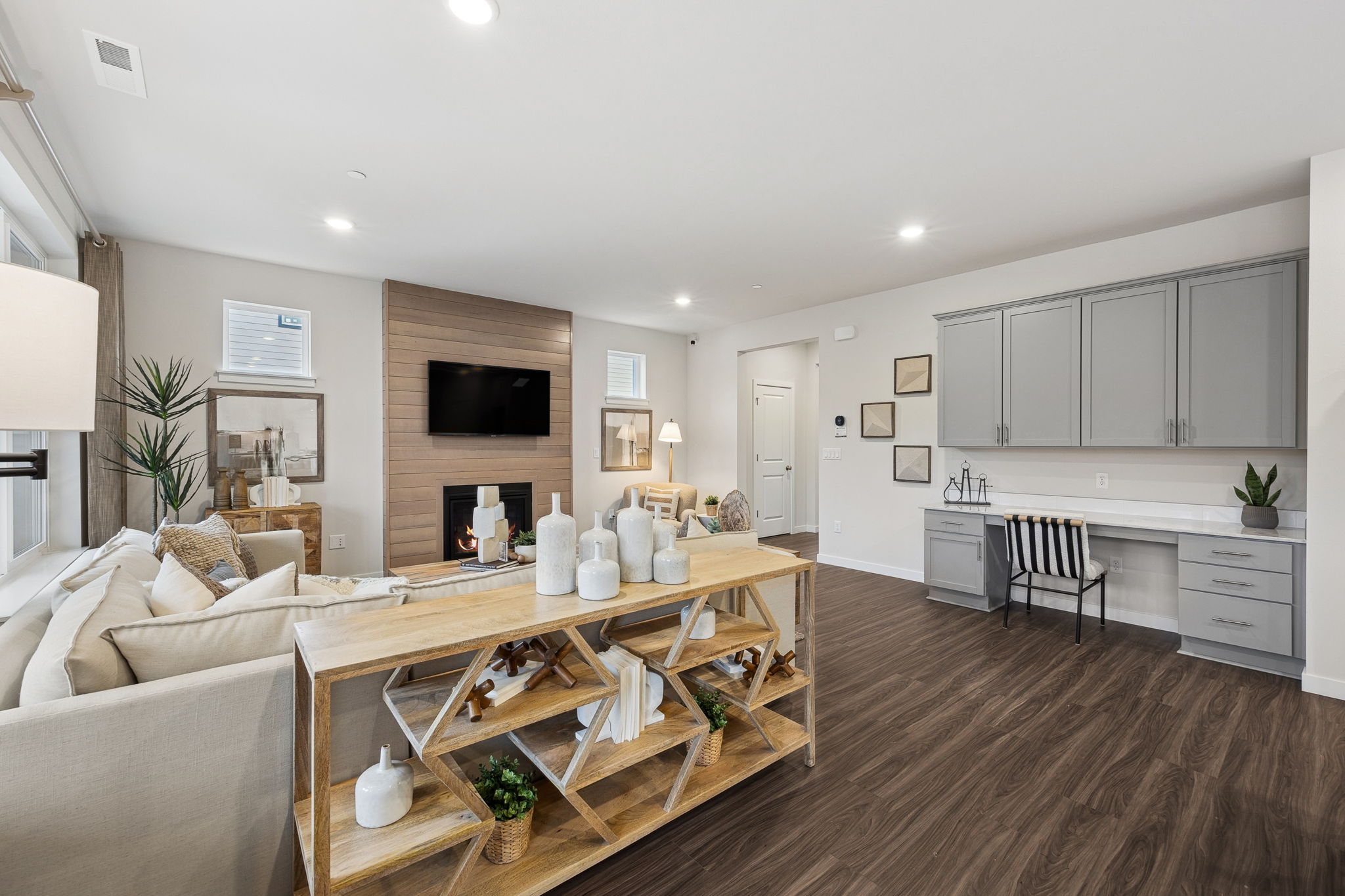A living room with a dining table.