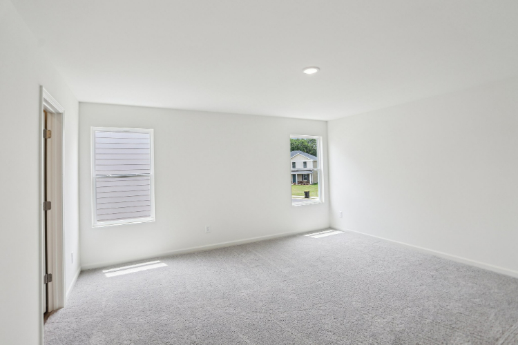 A room with a door and a window.