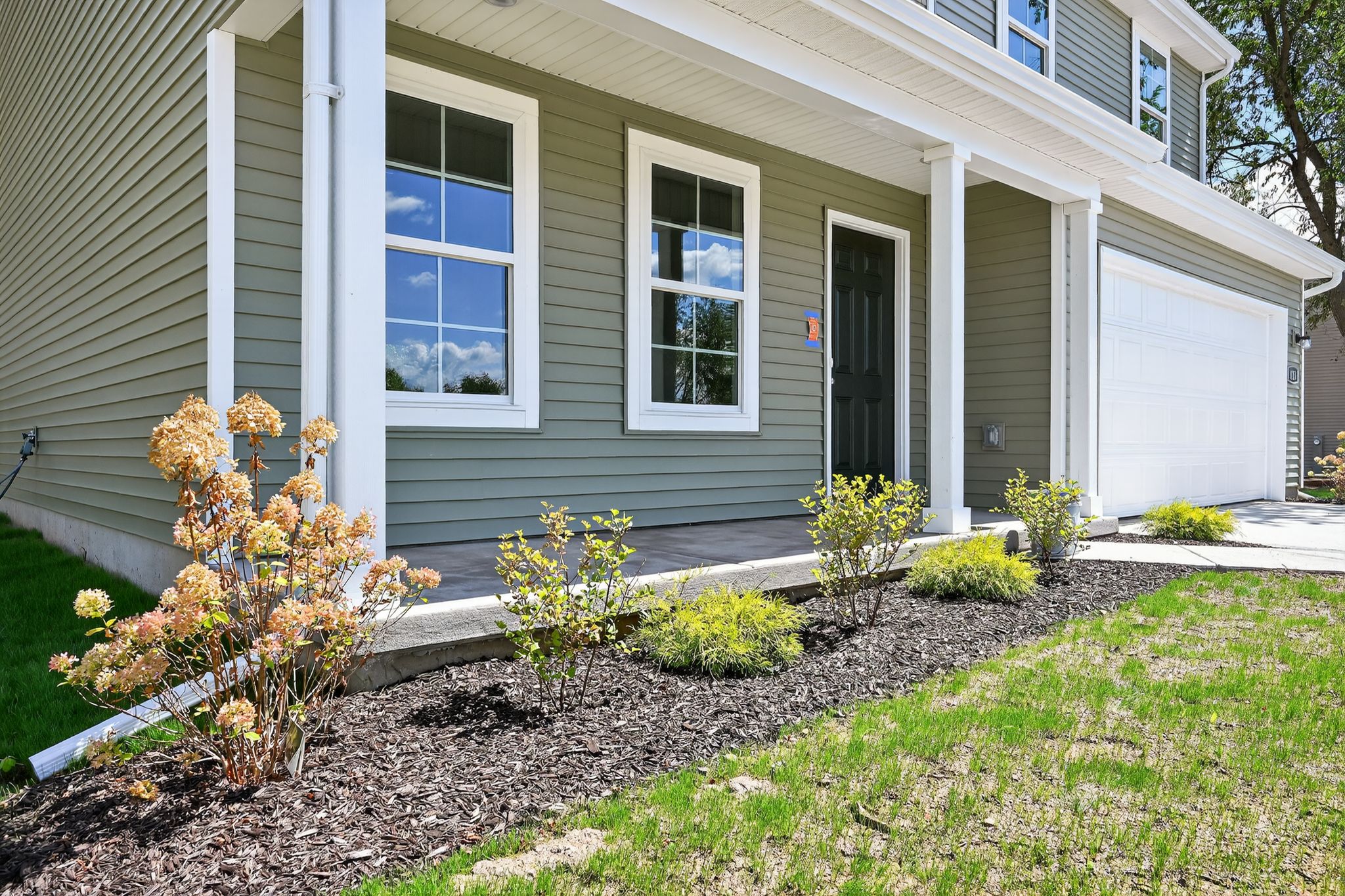 A house with a front yard.