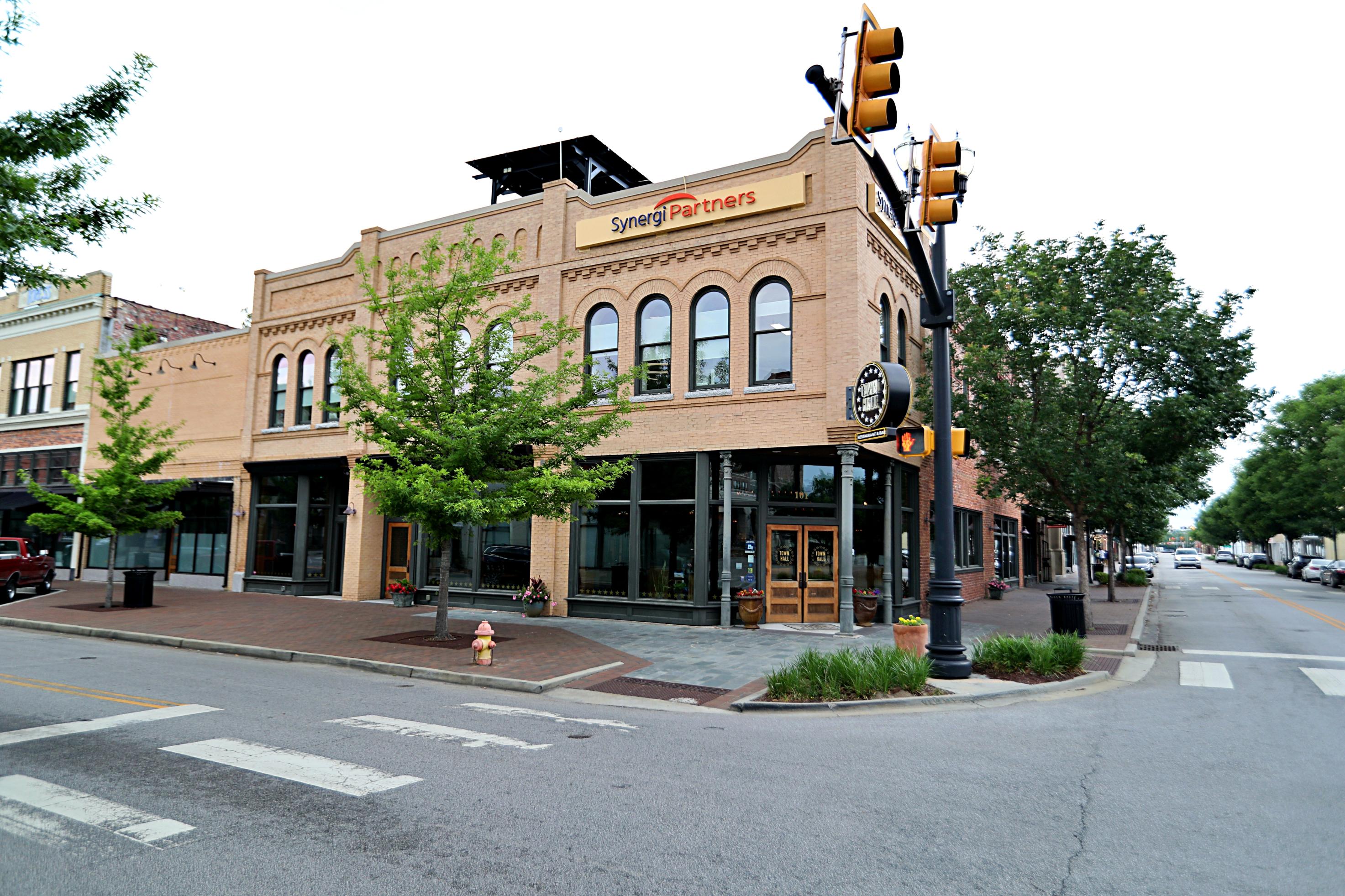 A building with a clock on the front.