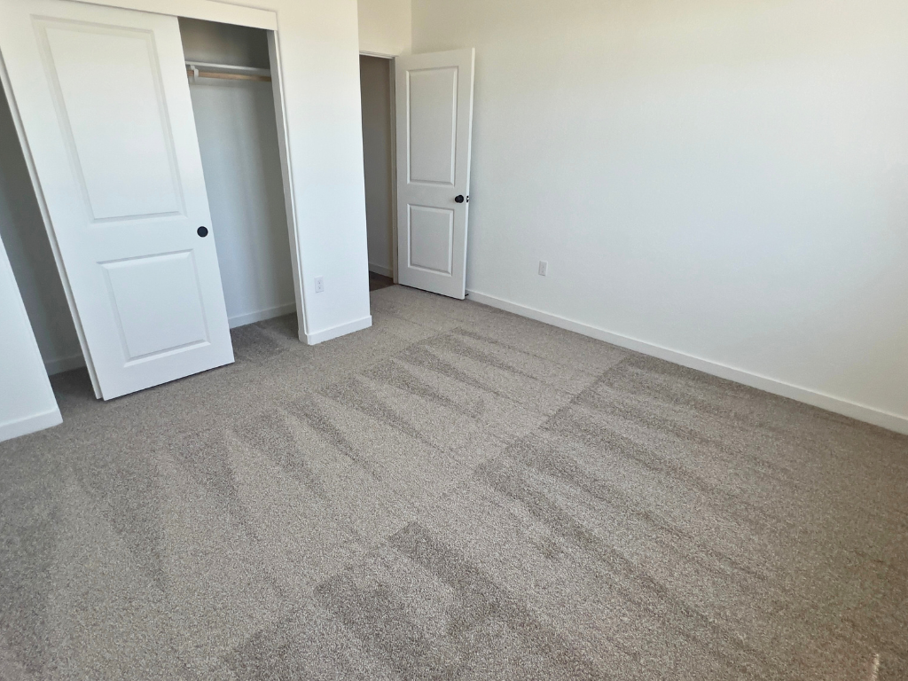 A room with white doors.